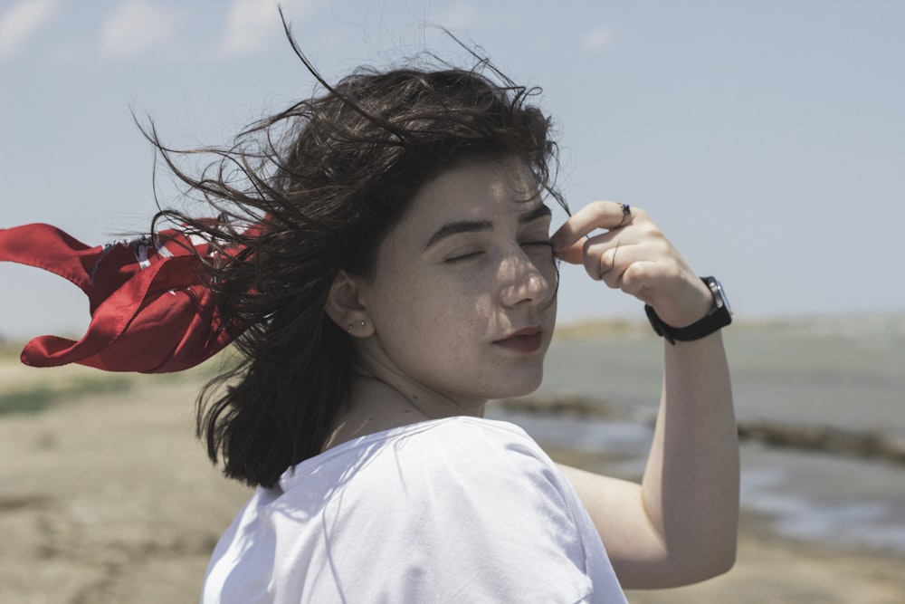 woman white shirt in the shore