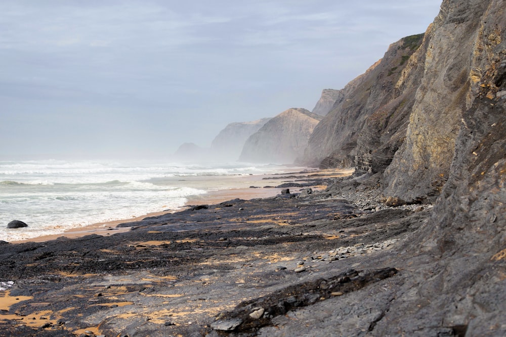 grey rock cliff at daytime