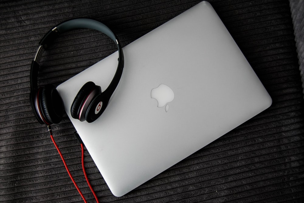 Beats By Dr. Dre headphones on MacBook