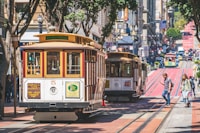 two white and yellow train cabs