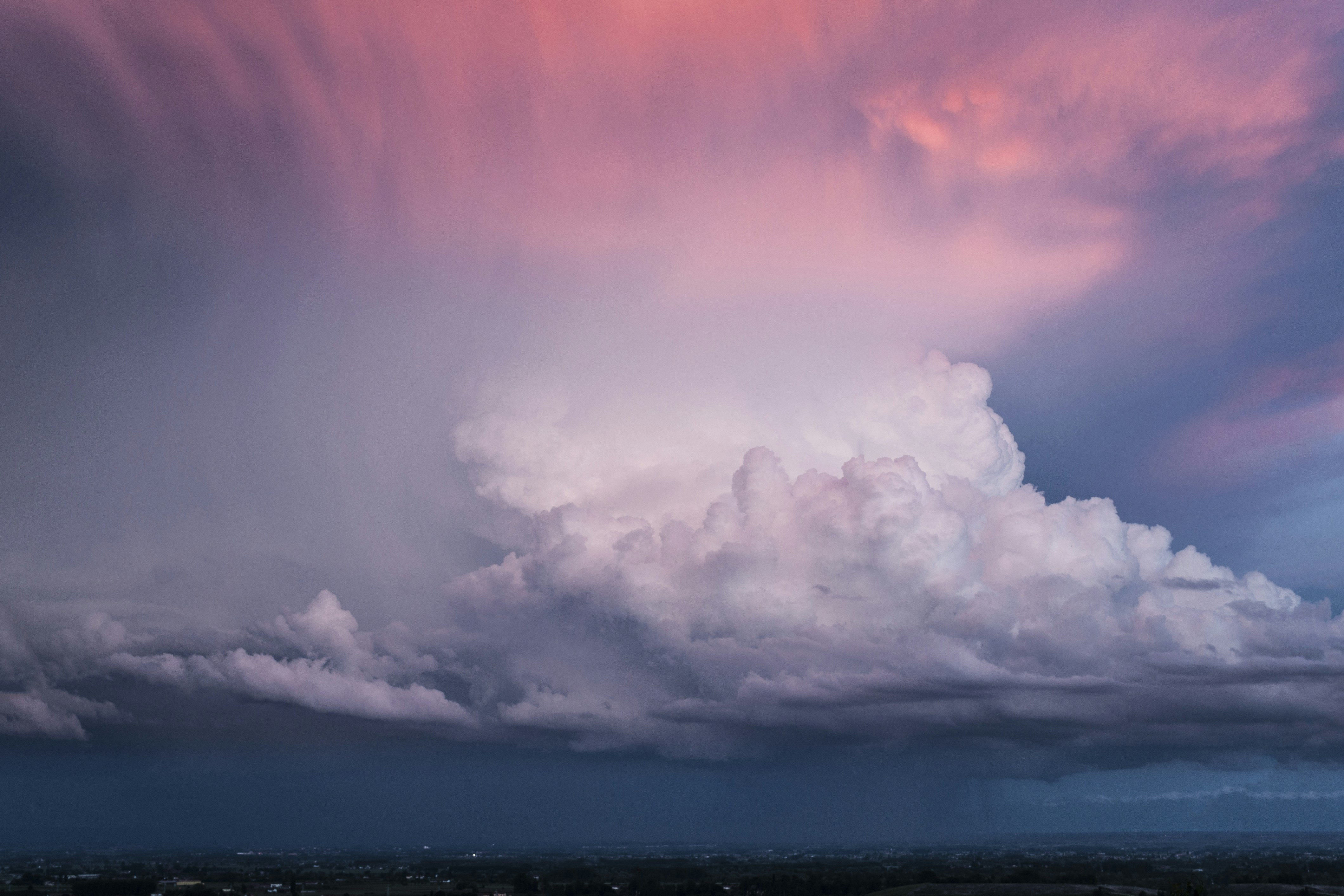 white clouds, storm at sunset