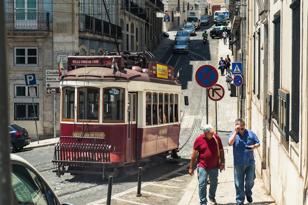 people near a train during daytime