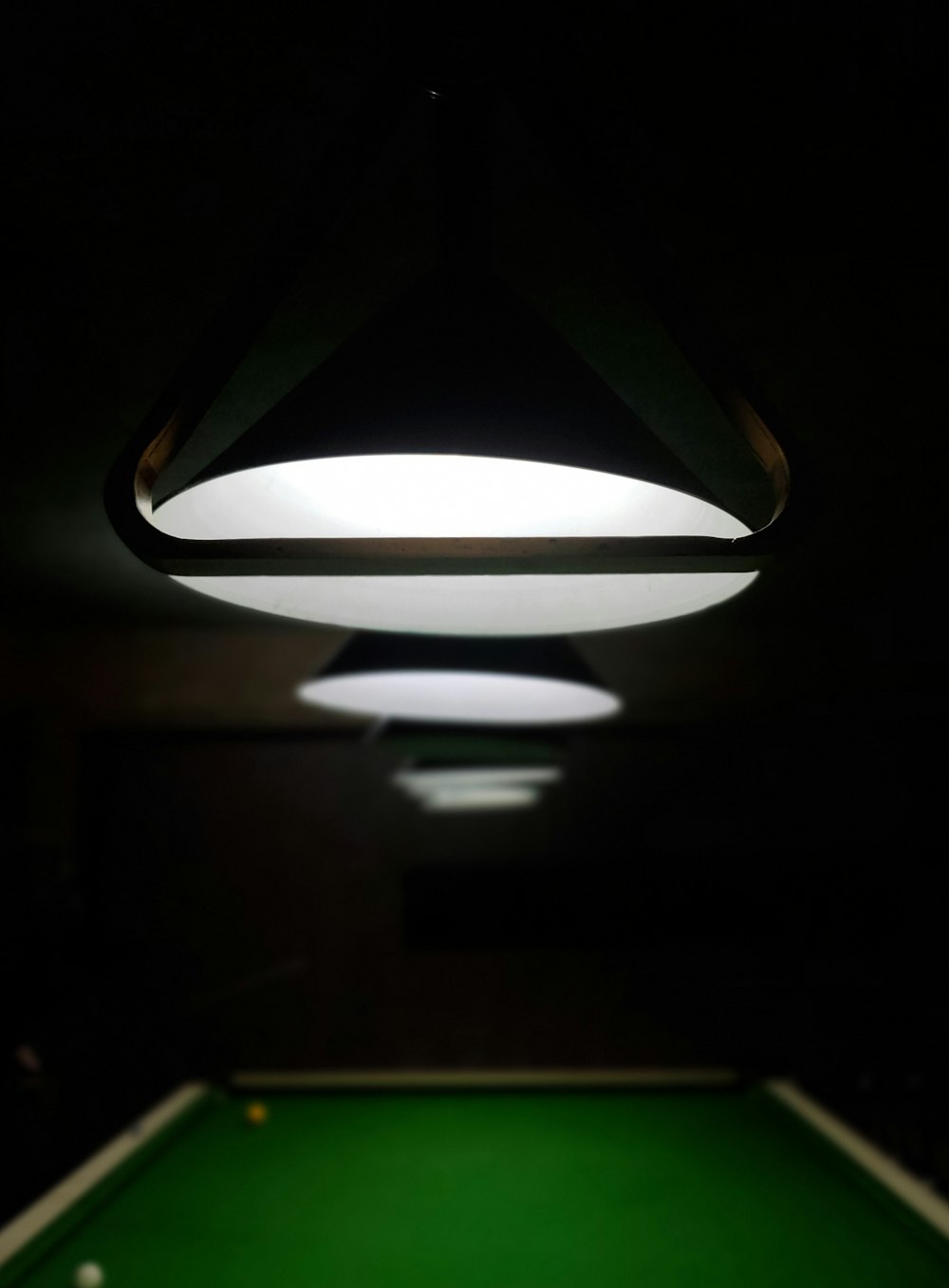 round white lights over billiard pool