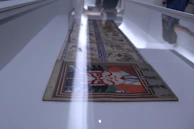 Close-up of a detailed artwork displayed during the exhibition.