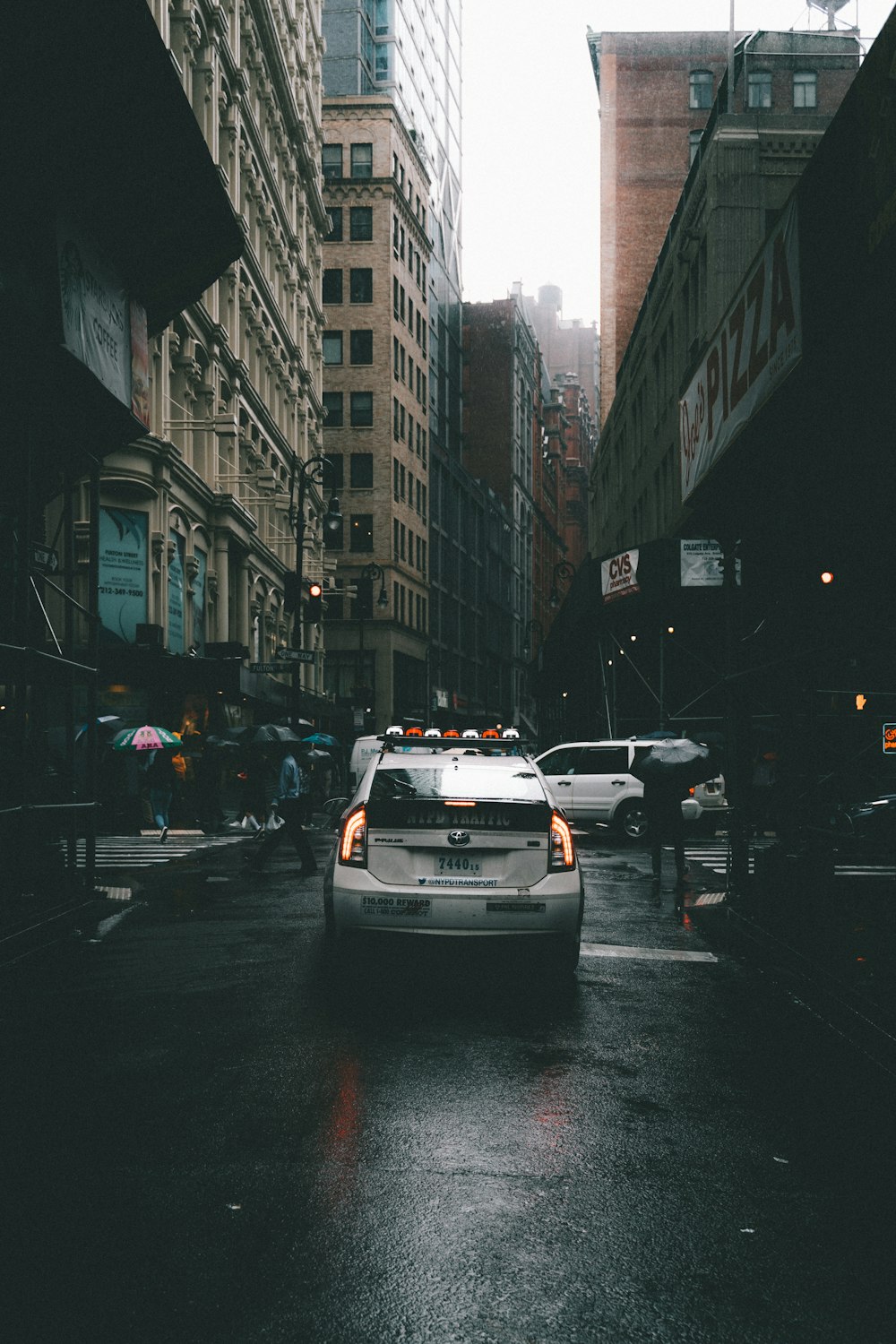 silver car running on street