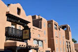 The fiduciapueblo office building bathed in warm afternoon light in the heart of the pueblo.
