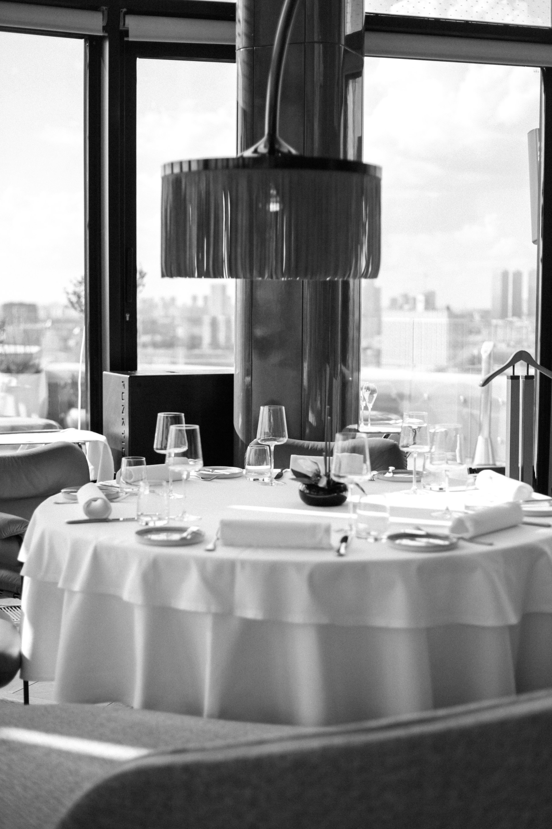 table and chairs near window