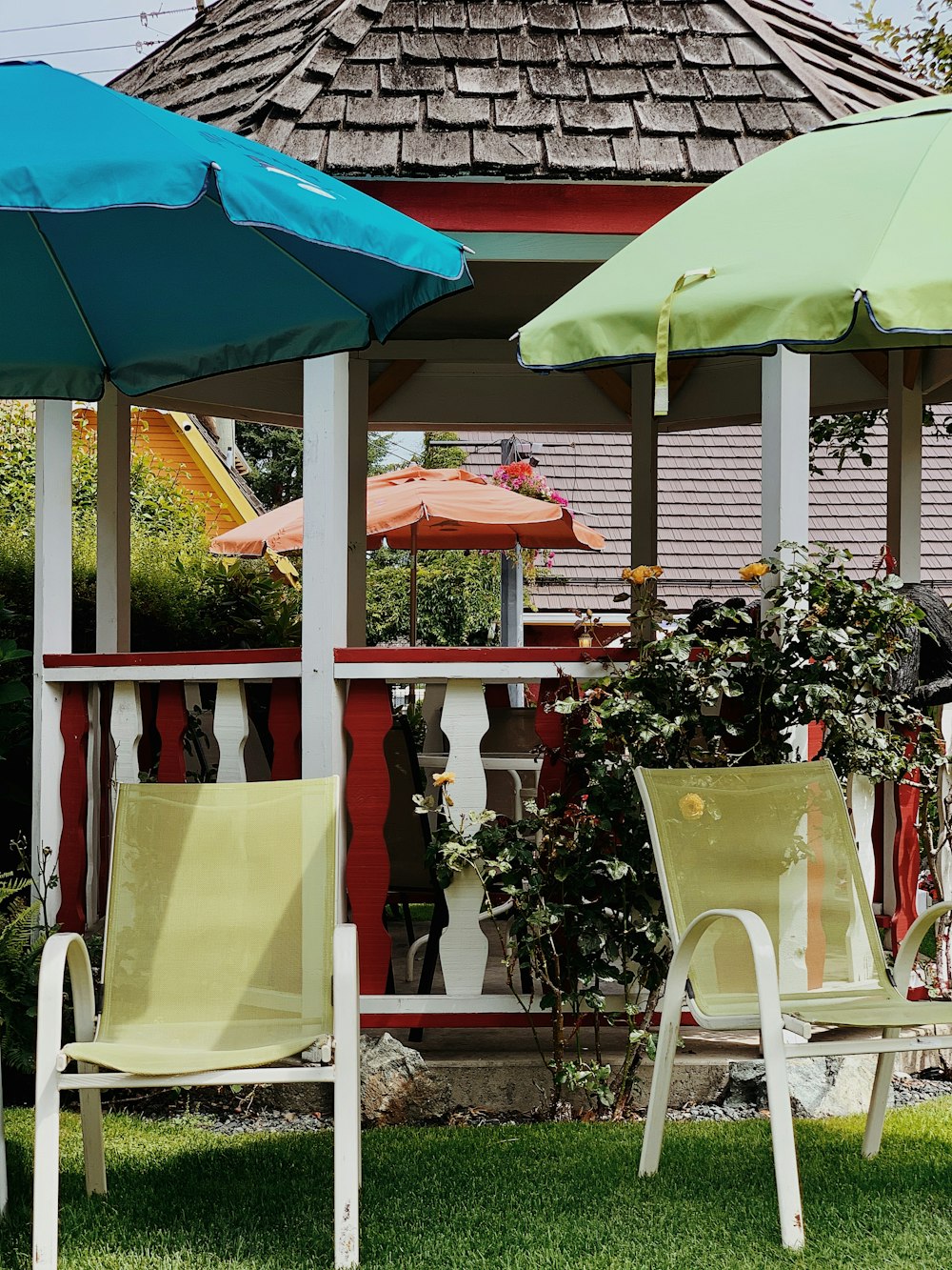 two green and blue patio umbrella