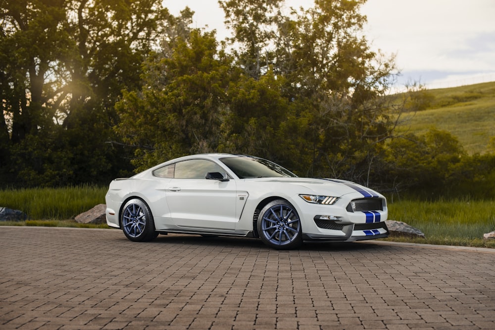 white Ford Mustang coupe