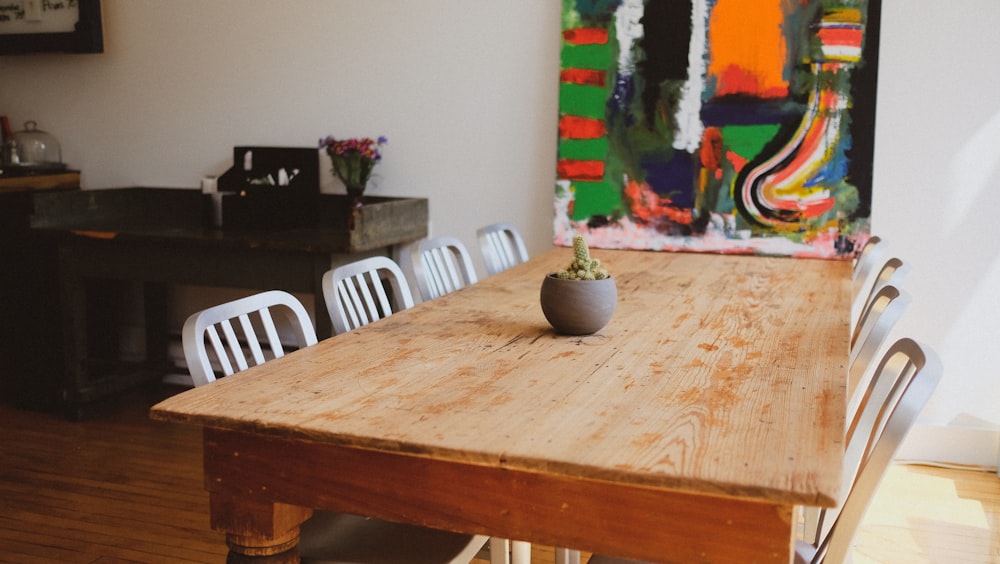 rectangular brown table with chairs set