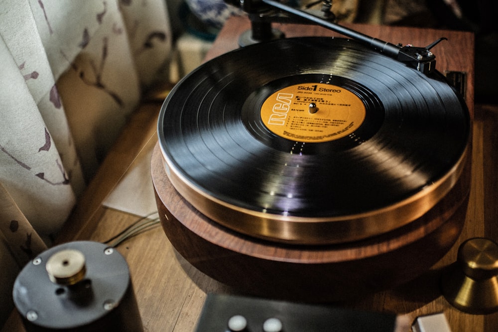 vinyl disc on brown turntable