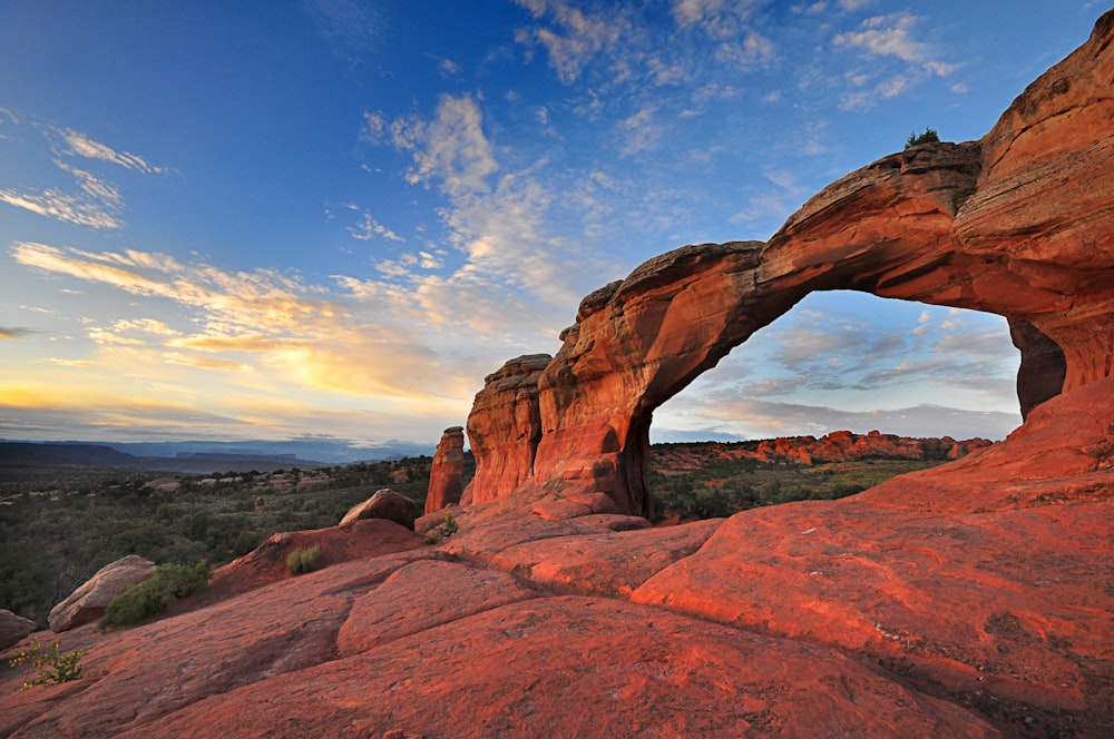 brown rocky cliff under blue sky