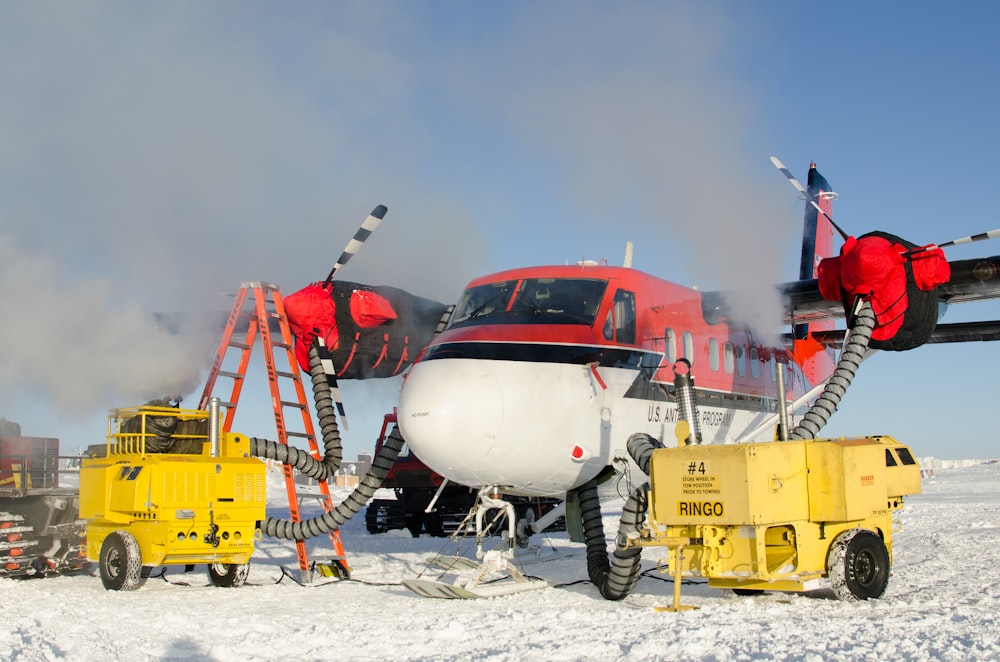 white and red plane