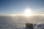 aerial photo of building on snow field