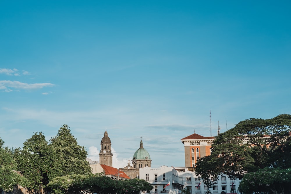 a large clock tower towering over a city