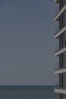 Modern condo building with balconies overlooking the sea in Trat province.