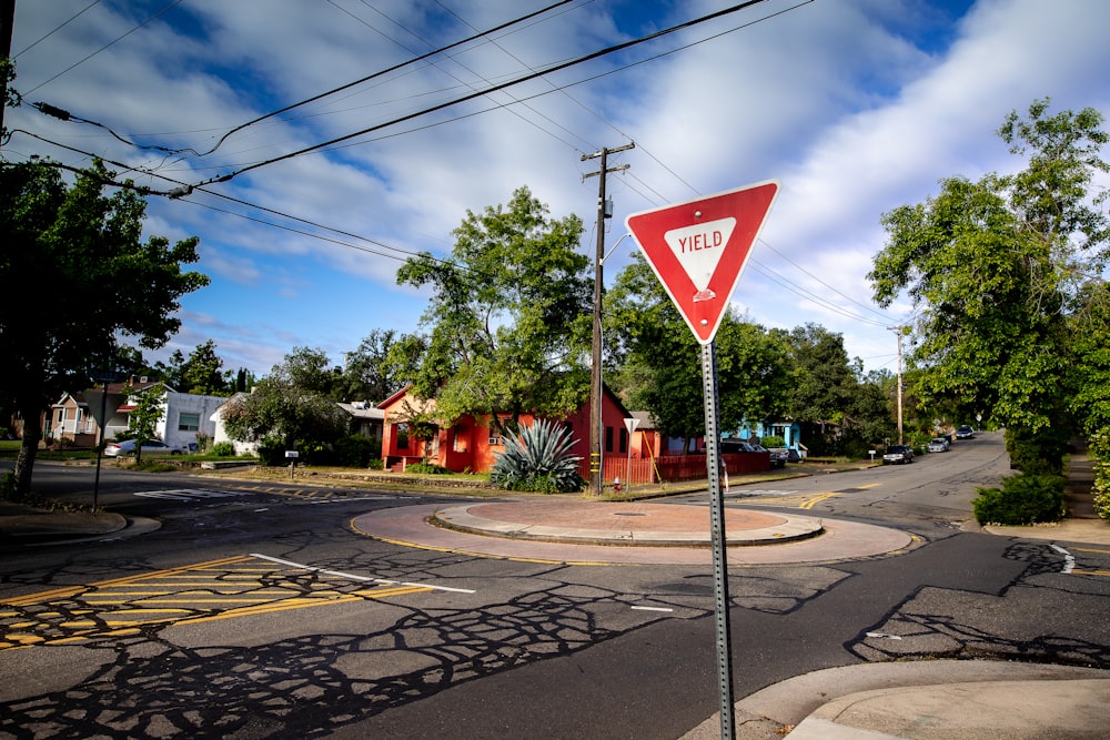 red street signage on focus photography