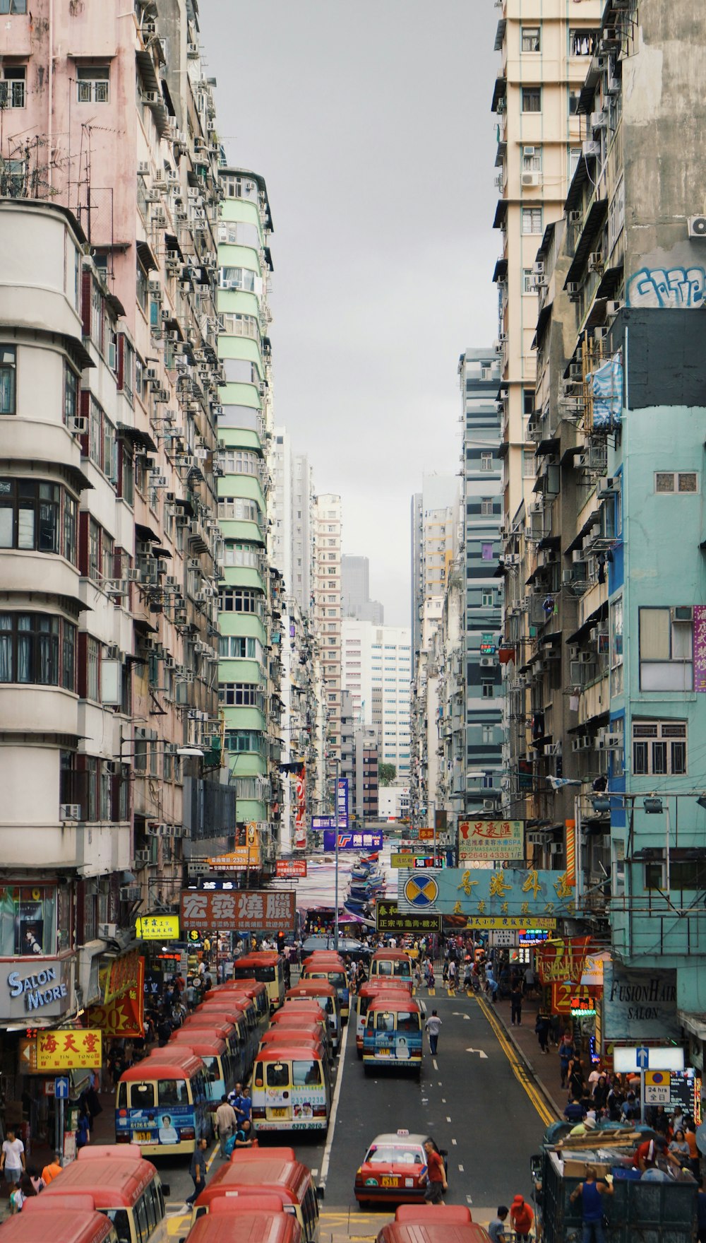 urban photo of a road full of busses