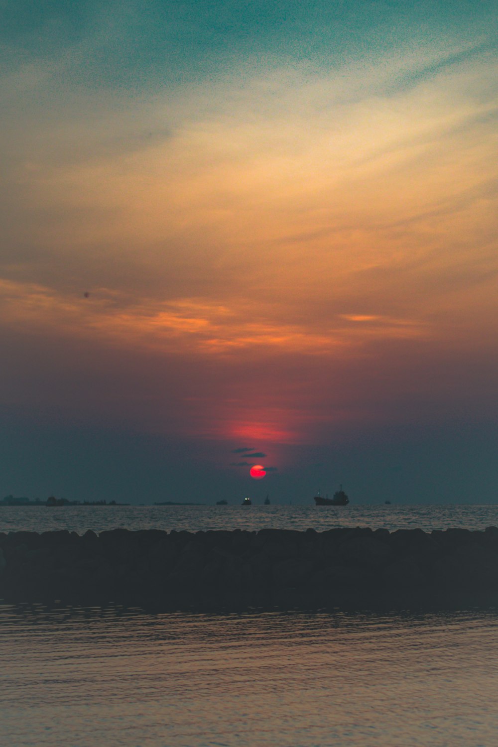 landscape photo of a beach at sunset