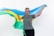 A joyful person celebrating their work visa approval with a backdrop of the American flag.