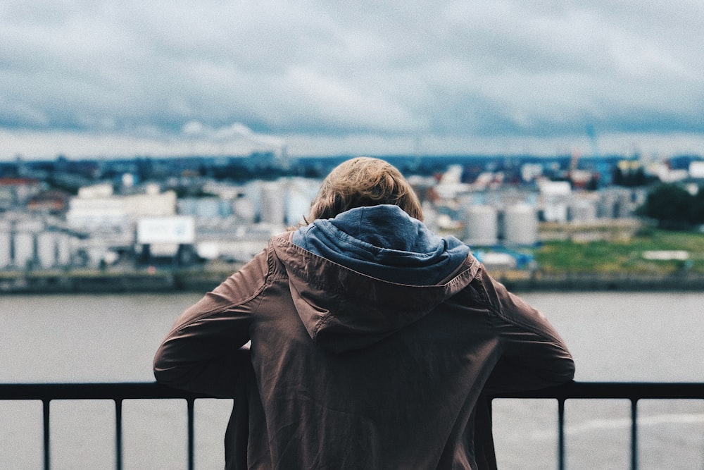 person standing near body of water