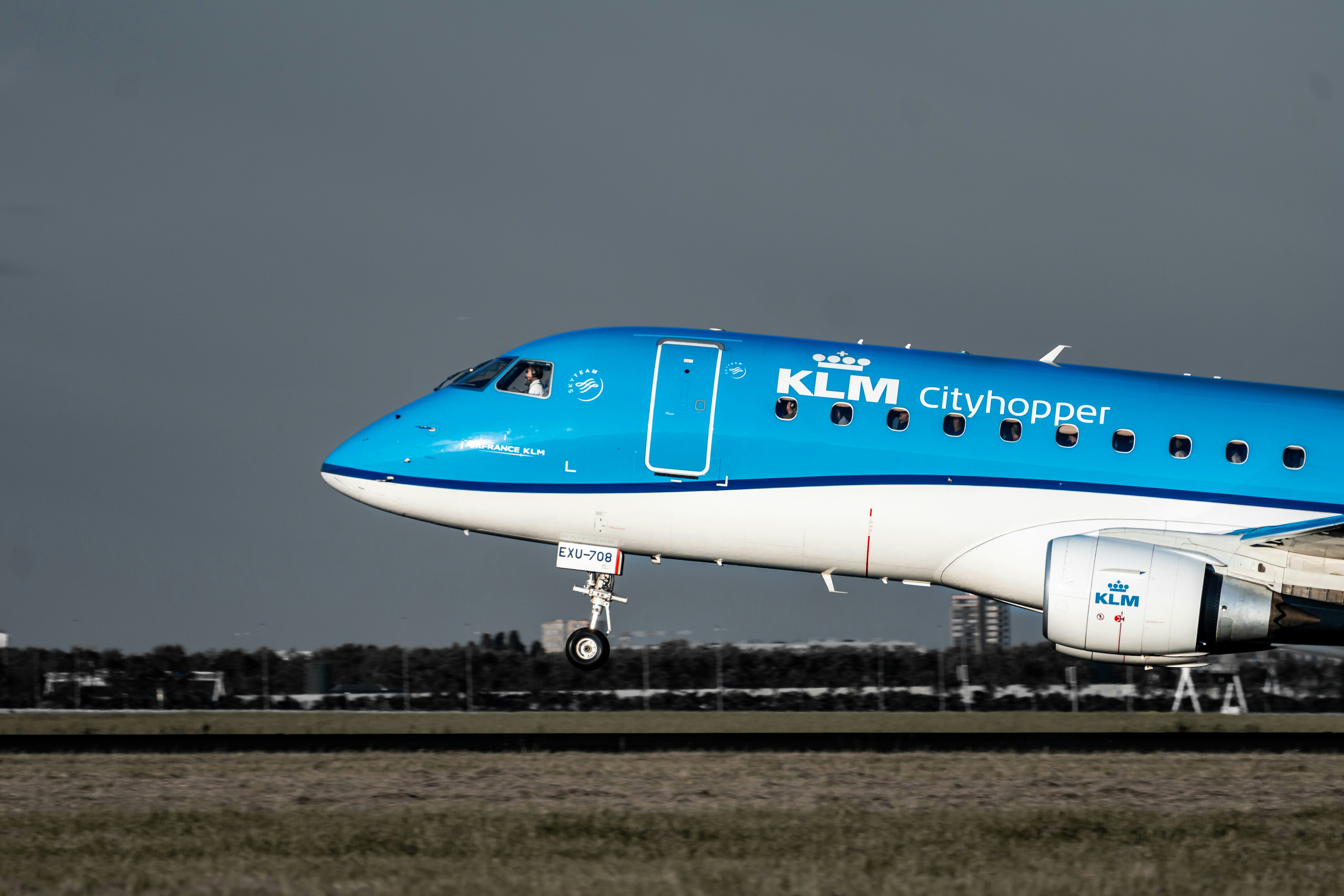 white and blue KLM airplane during daytime