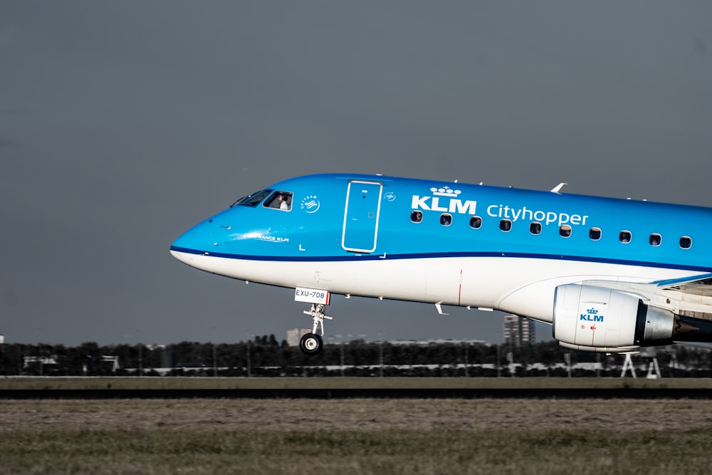white and blue KLM airplane during daytime