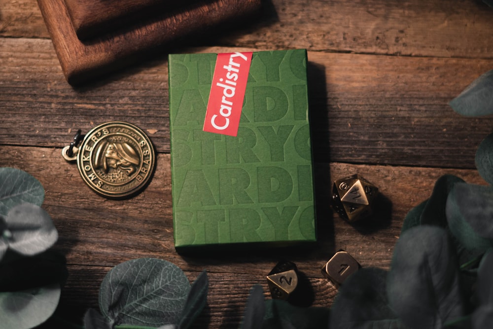 green Cardistry box on brown wooden surface