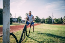 man doing rope exercise