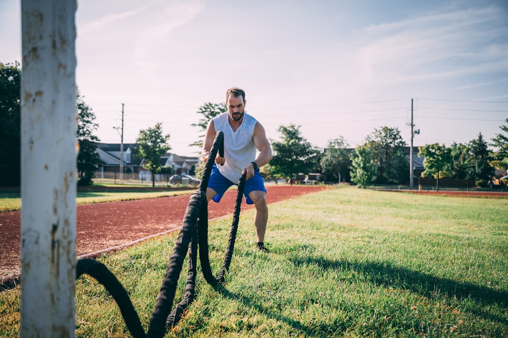 man doing rope exercise