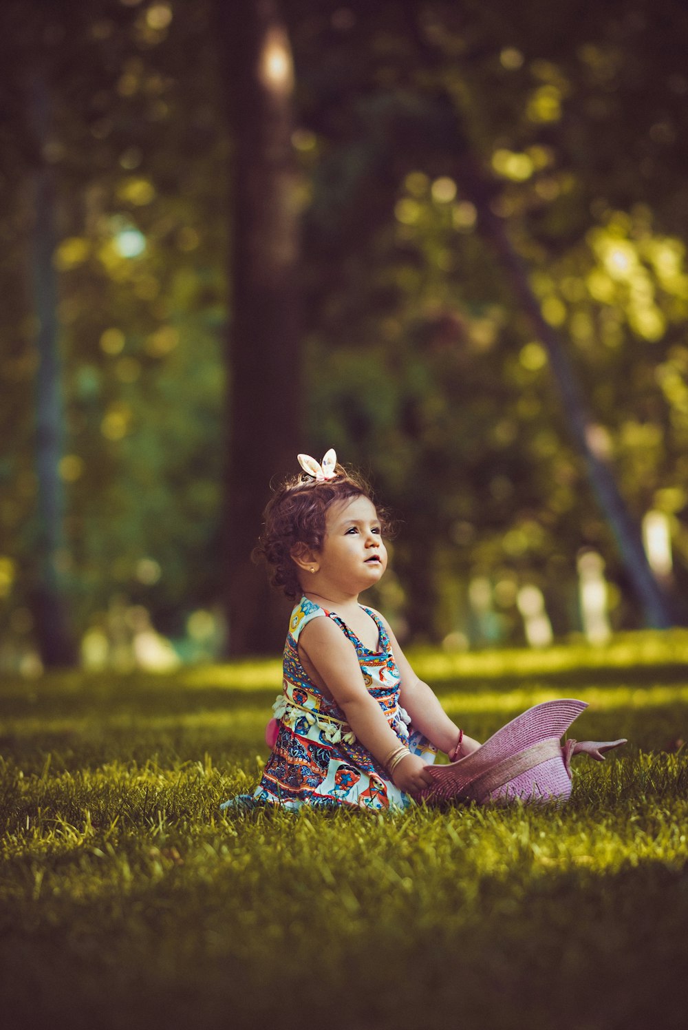 girl sitting on grass