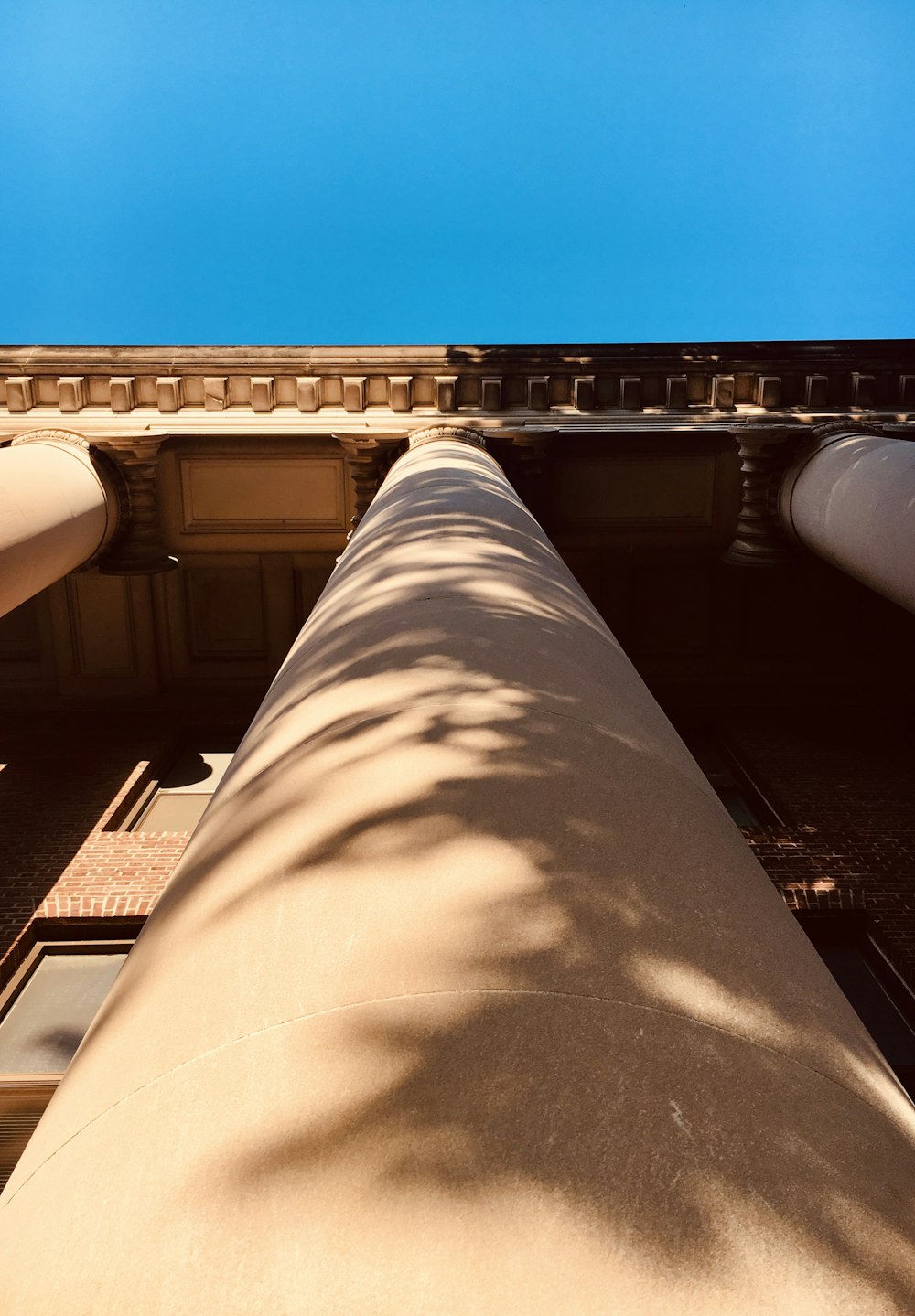 a view of the top of a building from below