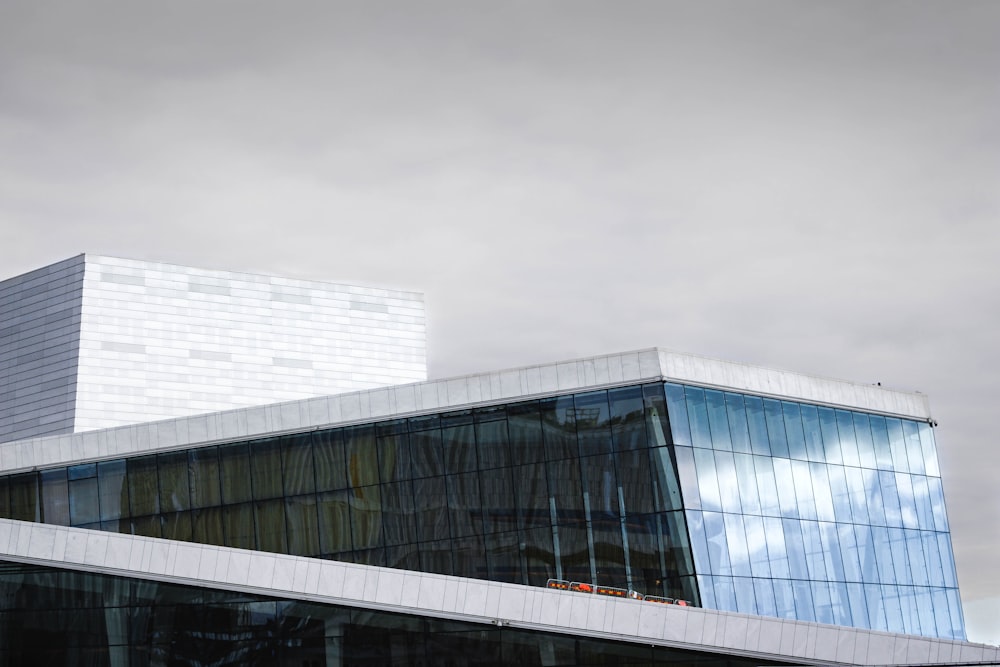 low-angle white and blue building