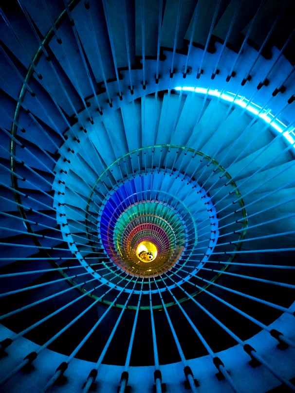 high-angle photography of spiral staircase
