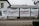 Large banners with bold text hang on the exterior wall of a building. The text is in German and translates to 'We women have rights!'. Several hashtags and the name 'UNIA' are visible on the right banner.