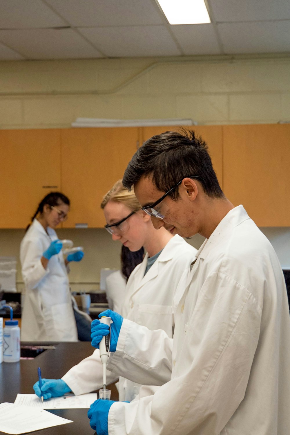 man in white lab coat