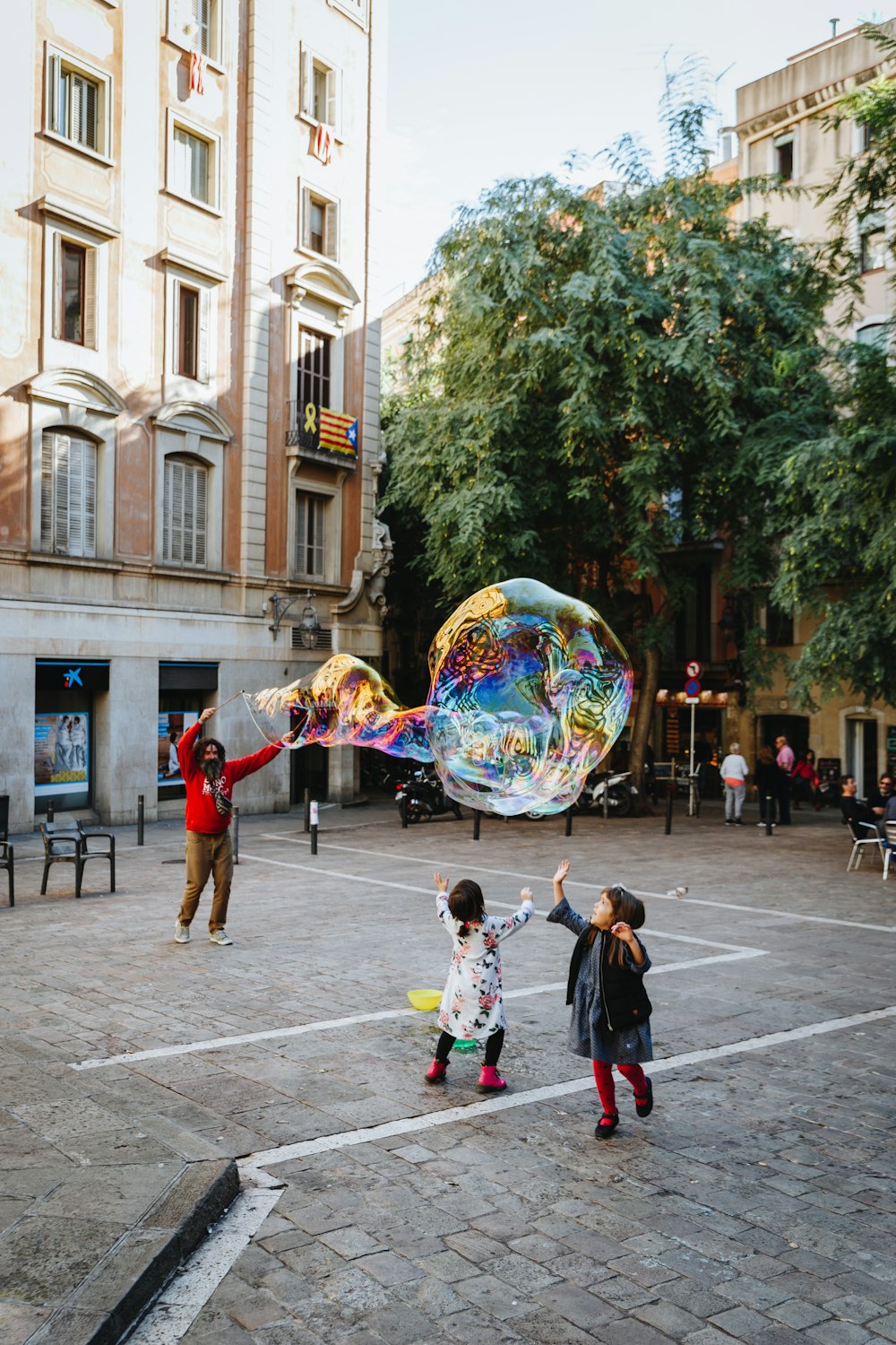 children playing with bubbles