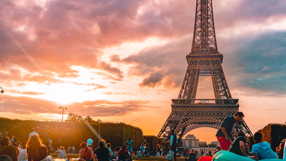 people standing near Eiffel tower
