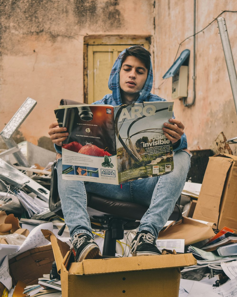 men holding a magazine during daytime