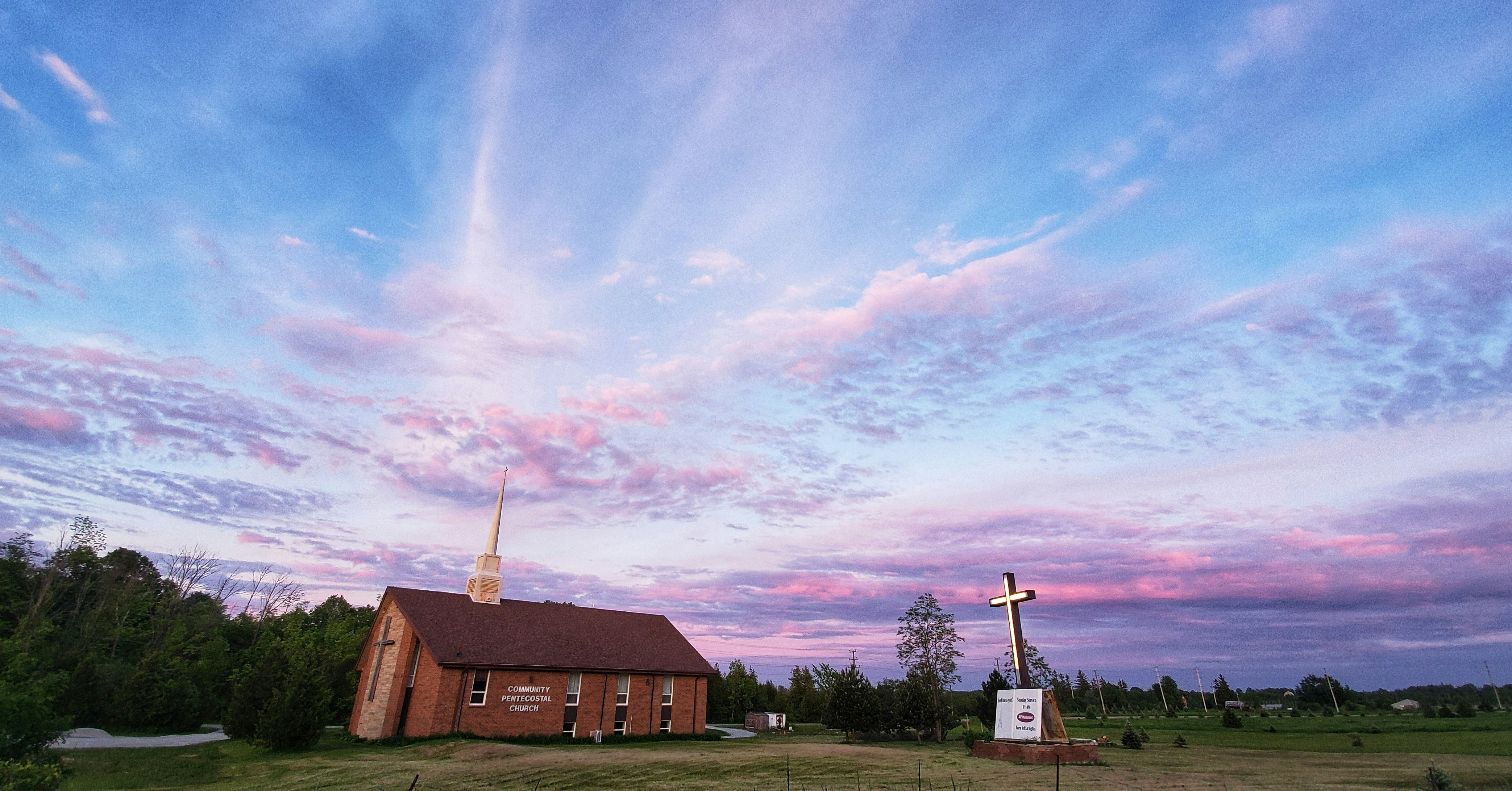 brown church near trees