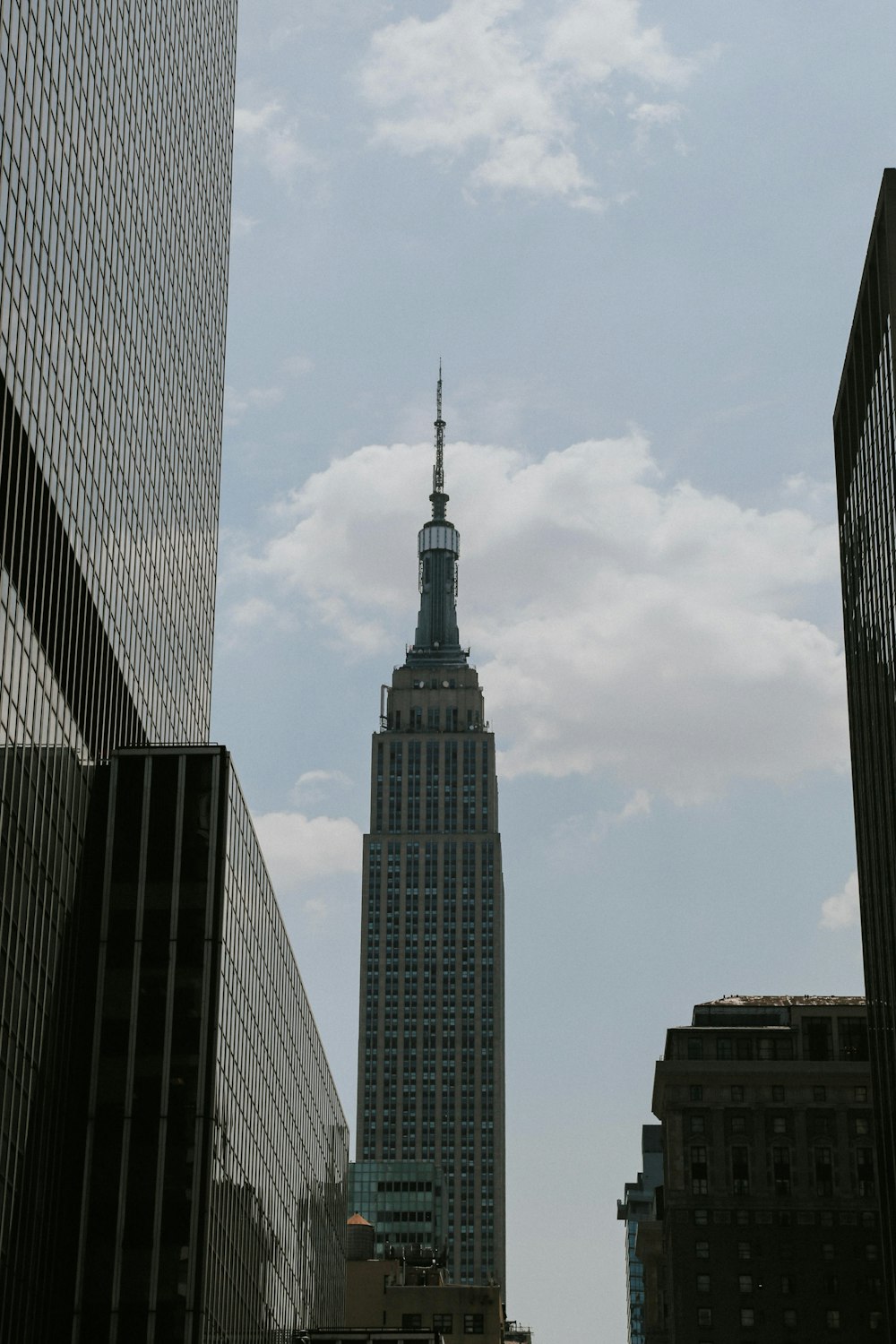 white clouds above tower