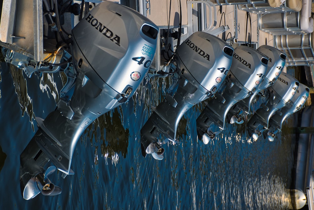 gray Honda outboard motors