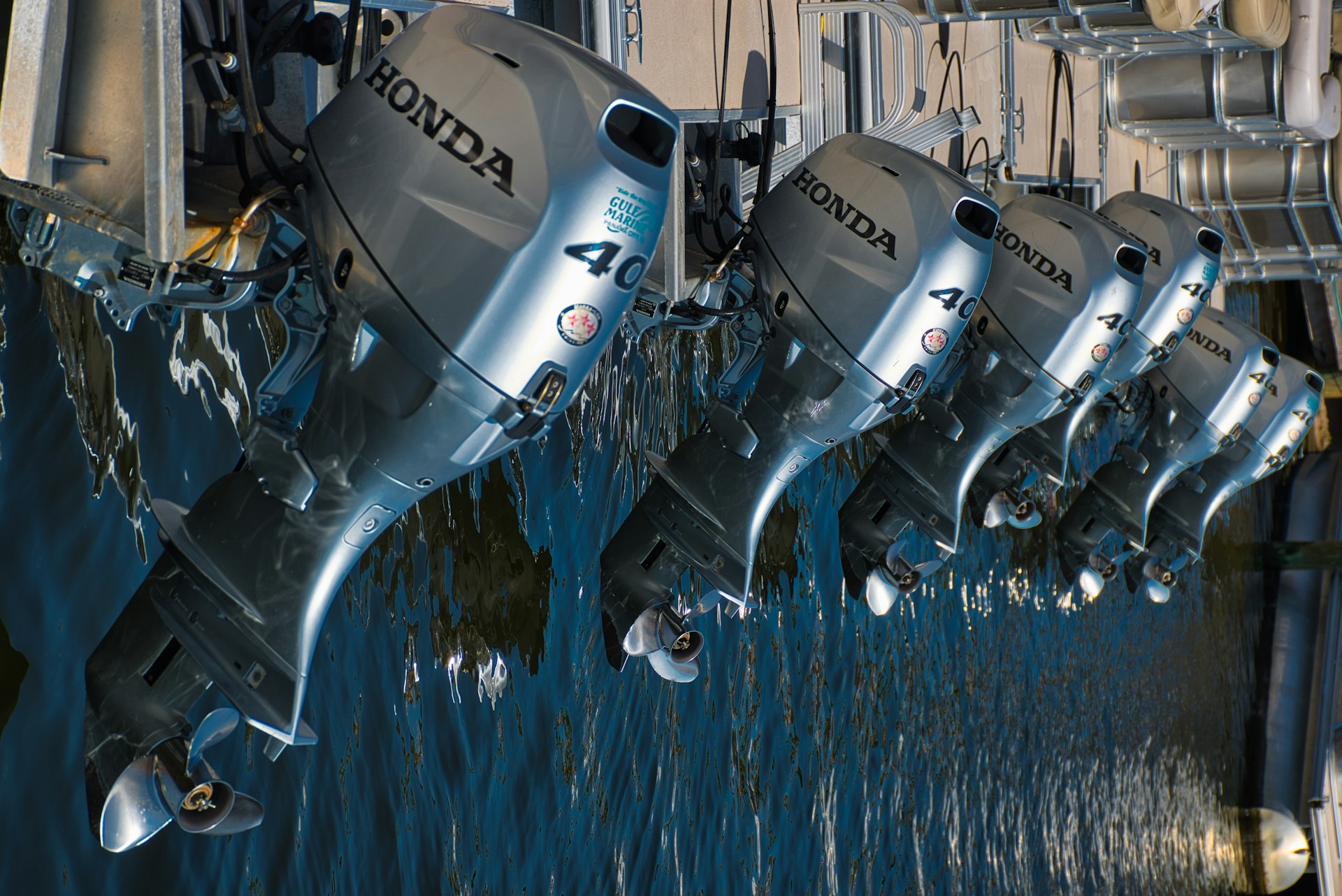gray Honda outboard motors