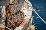 Marine hardware tools laid out on a weathered boat deck.