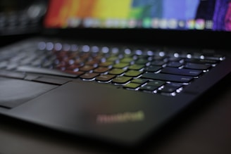 Close-up of a high-performance gaming laptop with illuminated keys