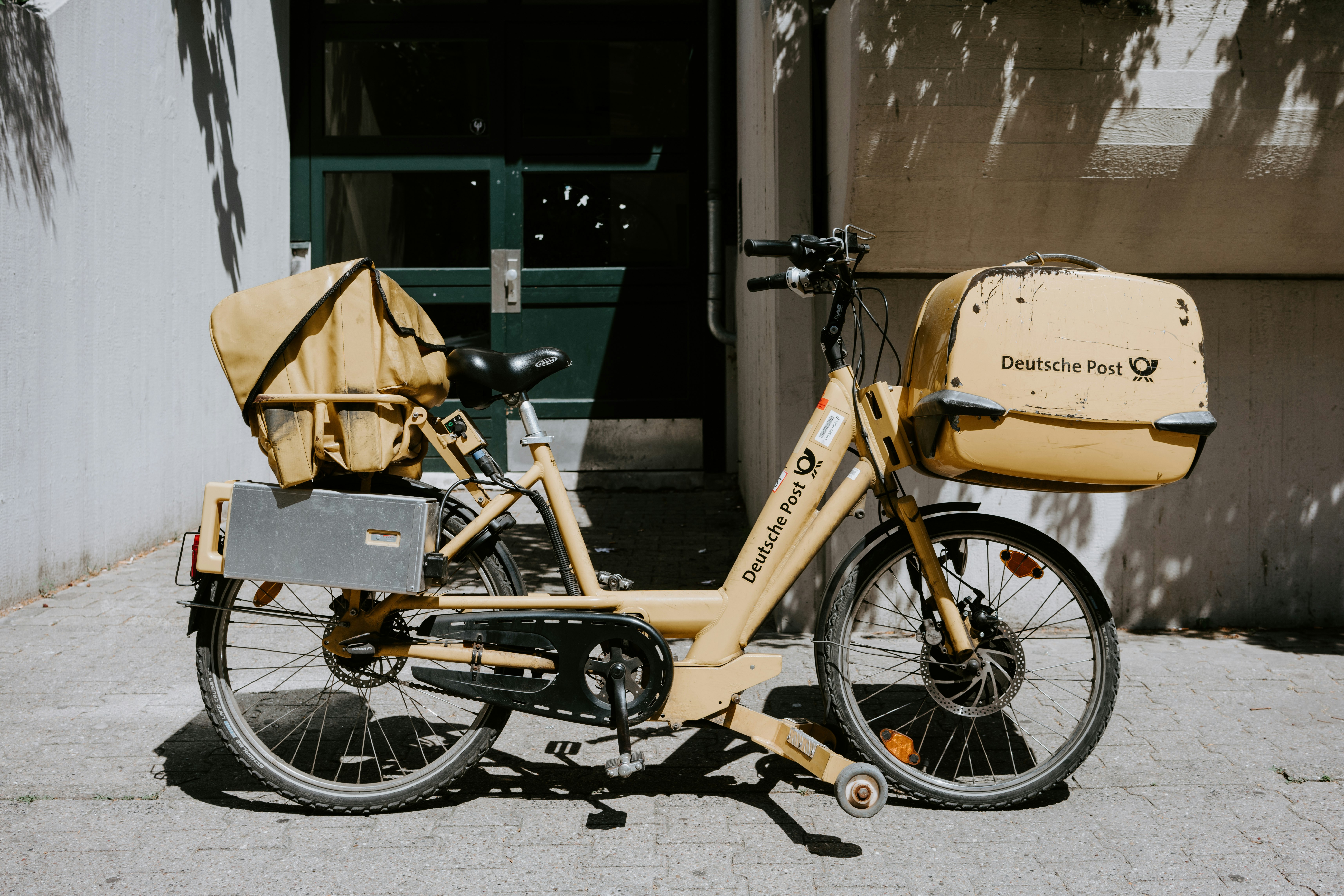 beige bike near gray wall