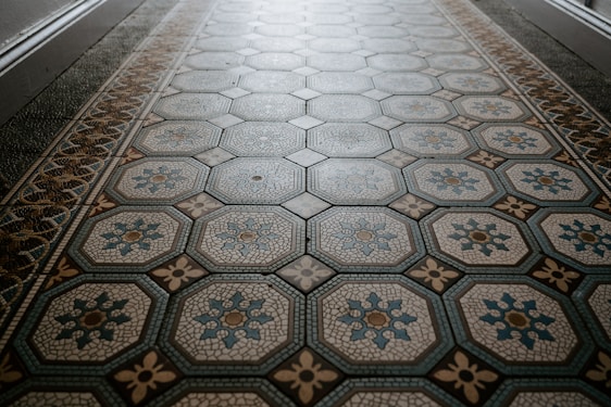 A close-up of beautifully tiled floor showcasing intricate patterns and colors.