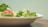 A close-up of a colorful plate filled with fresh vegetables and grains.