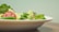 A close-up of a colorful plate filled with fresh vegetables and grains.