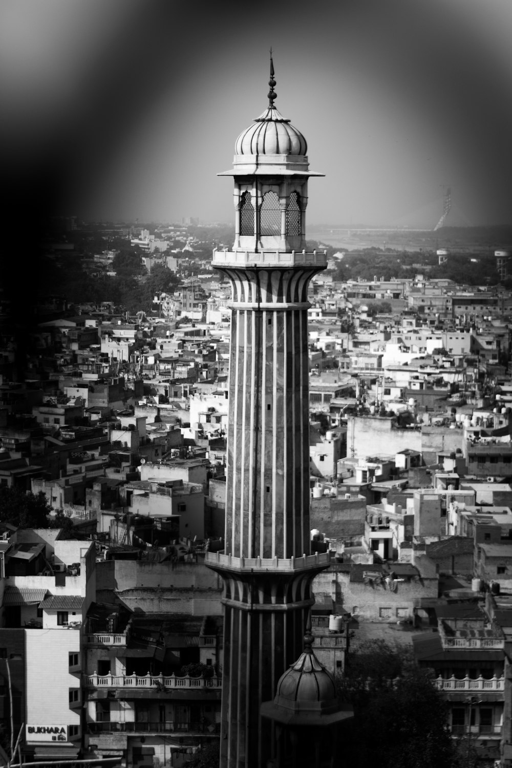 grayscale photography of tower during daytime